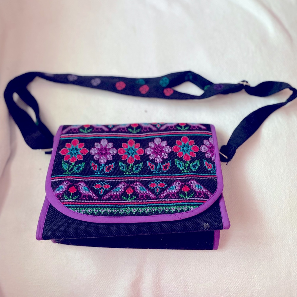 Fabric purse with Embroidery design on front also smaller bag inside